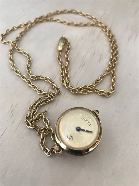 vintage gucci pendant watch